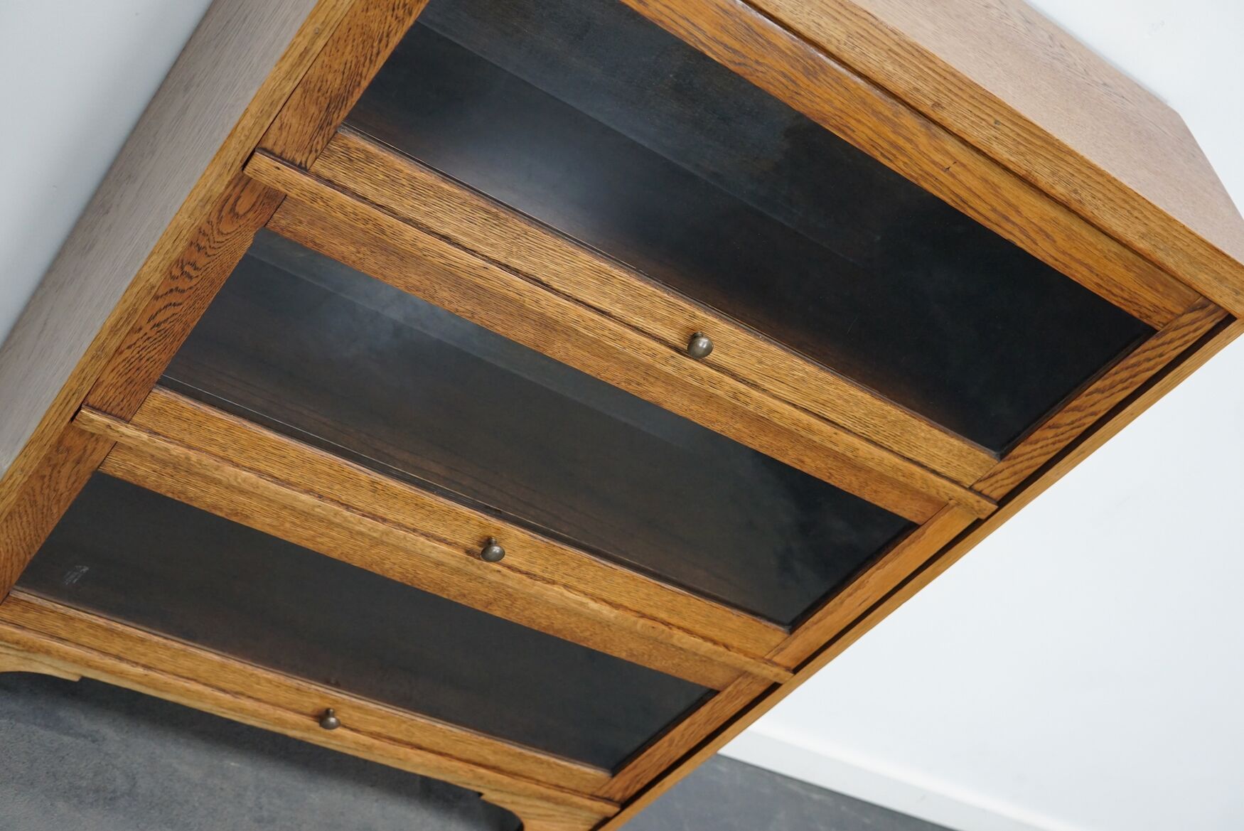German Oak Bookcase with Folding Doors In Style of Globe Wernicke, ca 1930s