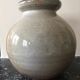 Glazed stoneware ball vase decorated with flowers