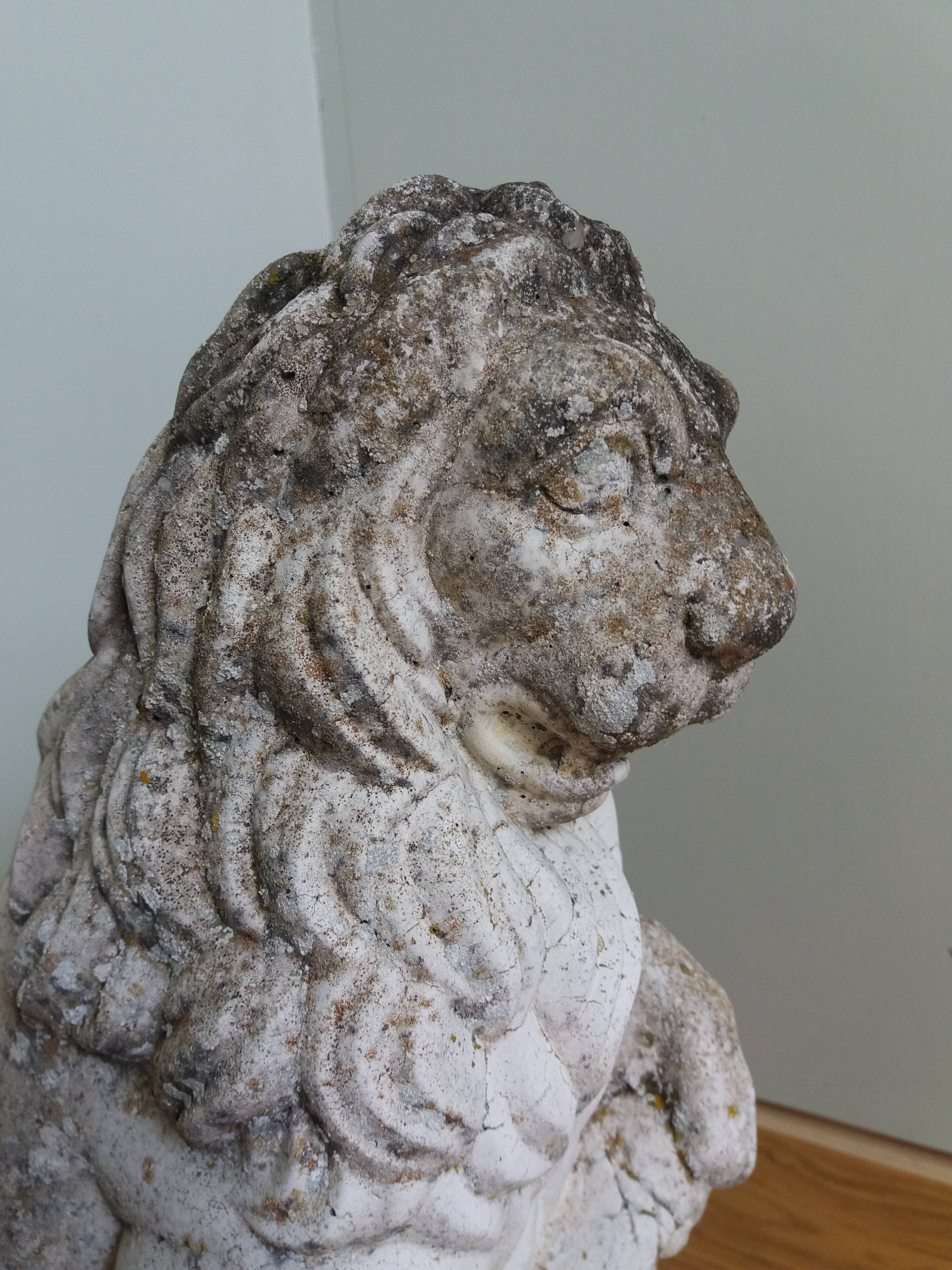 Lion garden statue in reconstituted stone