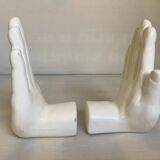 Paire de serre livres mains