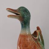 Water jug in slipware from the 1960s. Decorated with a coloured duck. Unmarked.