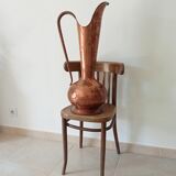 Old italian amphora vase in hammered copper