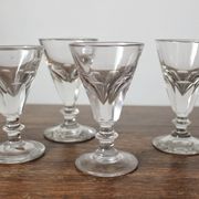 4 antique stemmed wine glasses with flat sides, made of blown glass from the 19th century