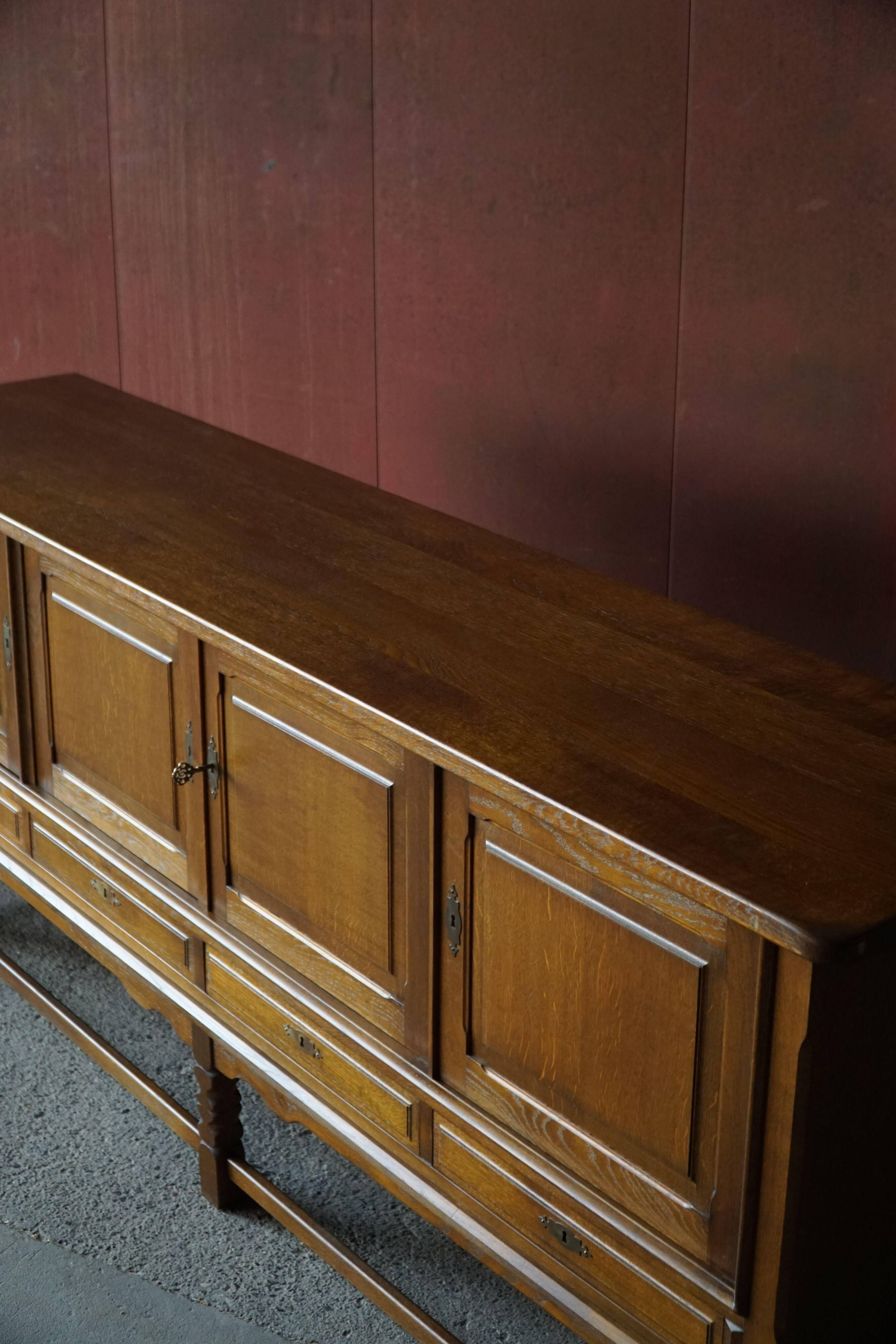 Danish enfilade from the mid-modern century in dark stained oak, 1960s.