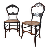 Pair of chairs from the early 20th century, Napoleon III style, with caned seats.