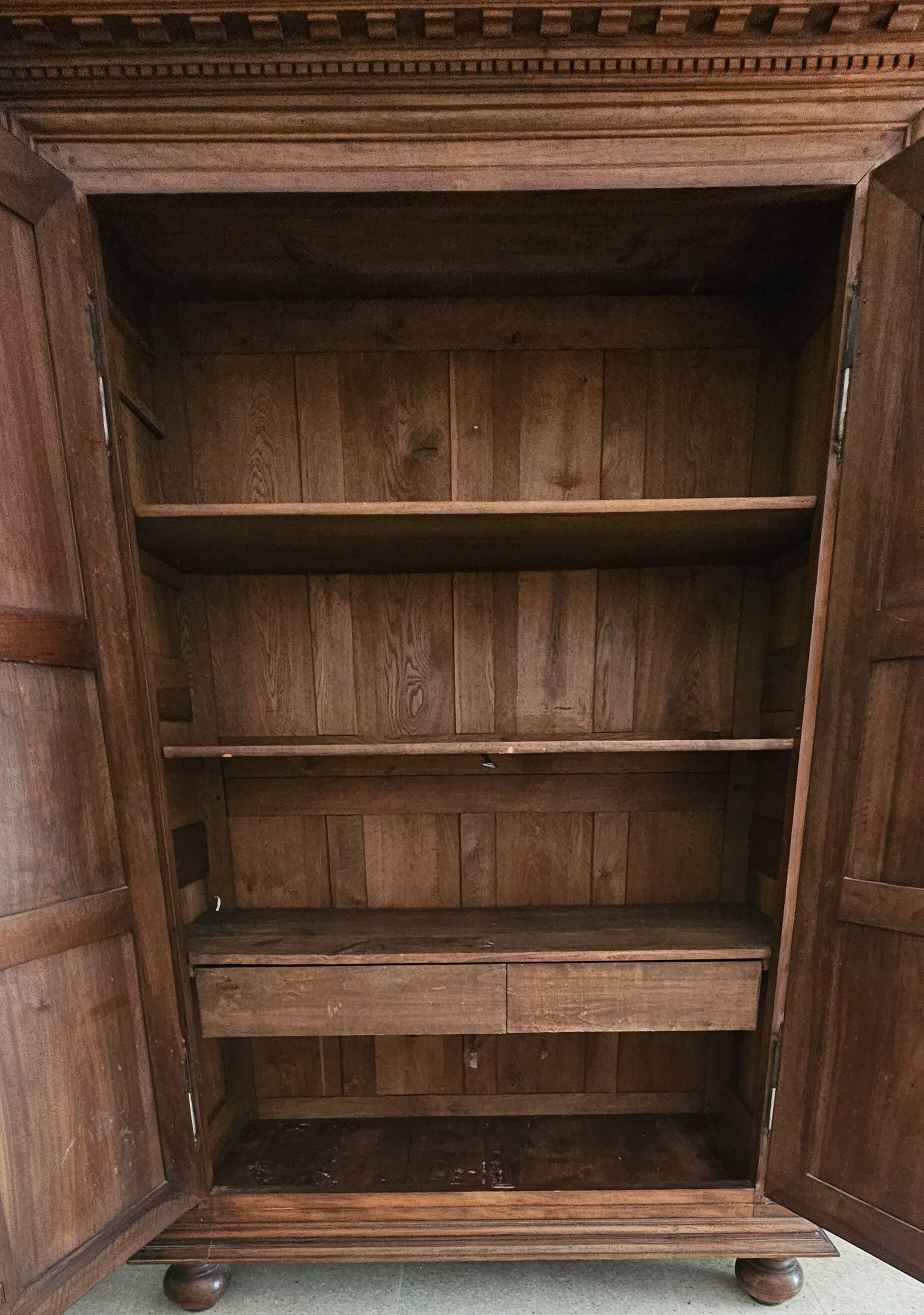 Carved cherubs cabinet