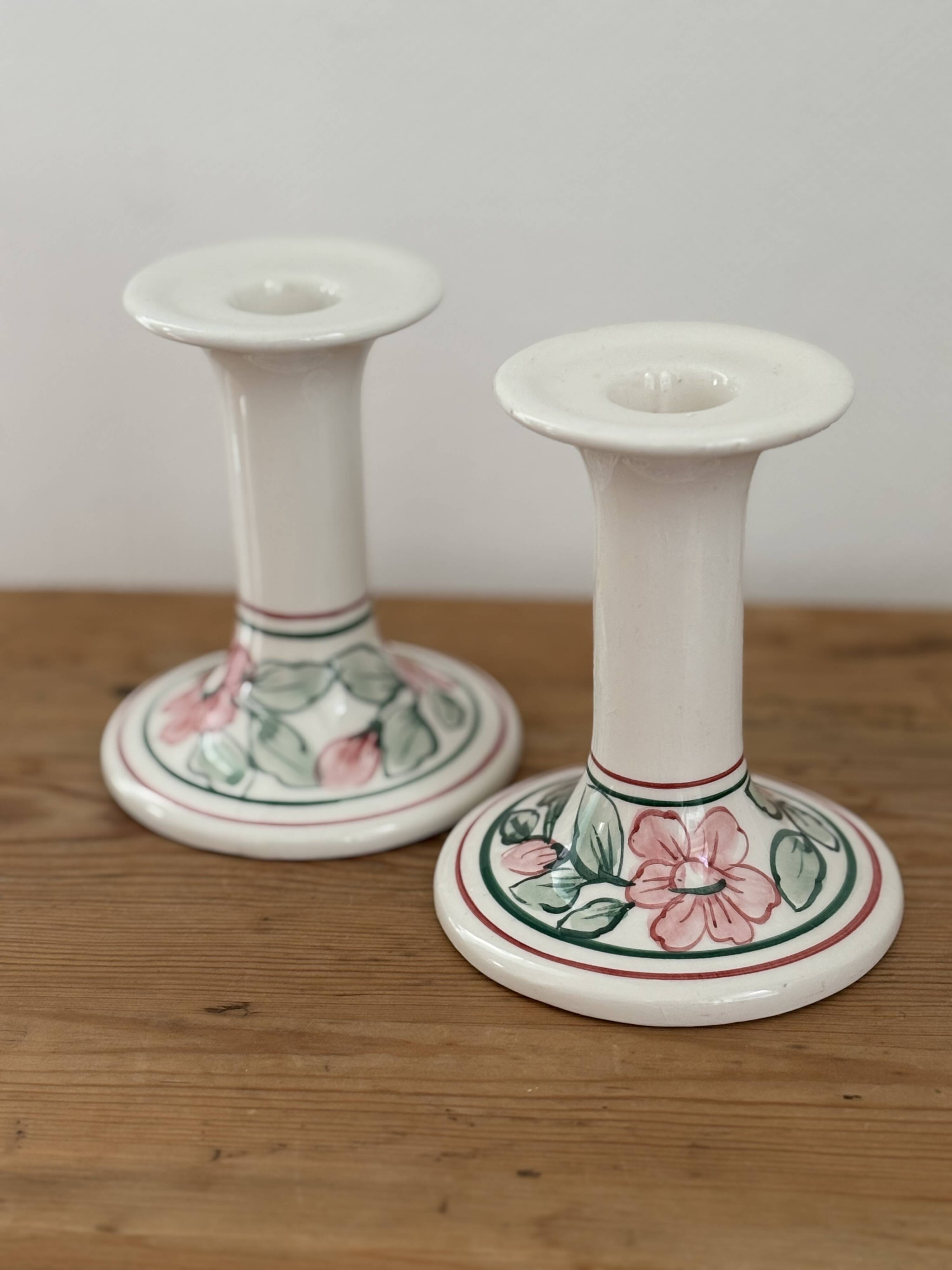 Pair of hand-painted English porcelain candlesticks
