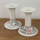 Pair of hand-painted English porcelain candlesticks