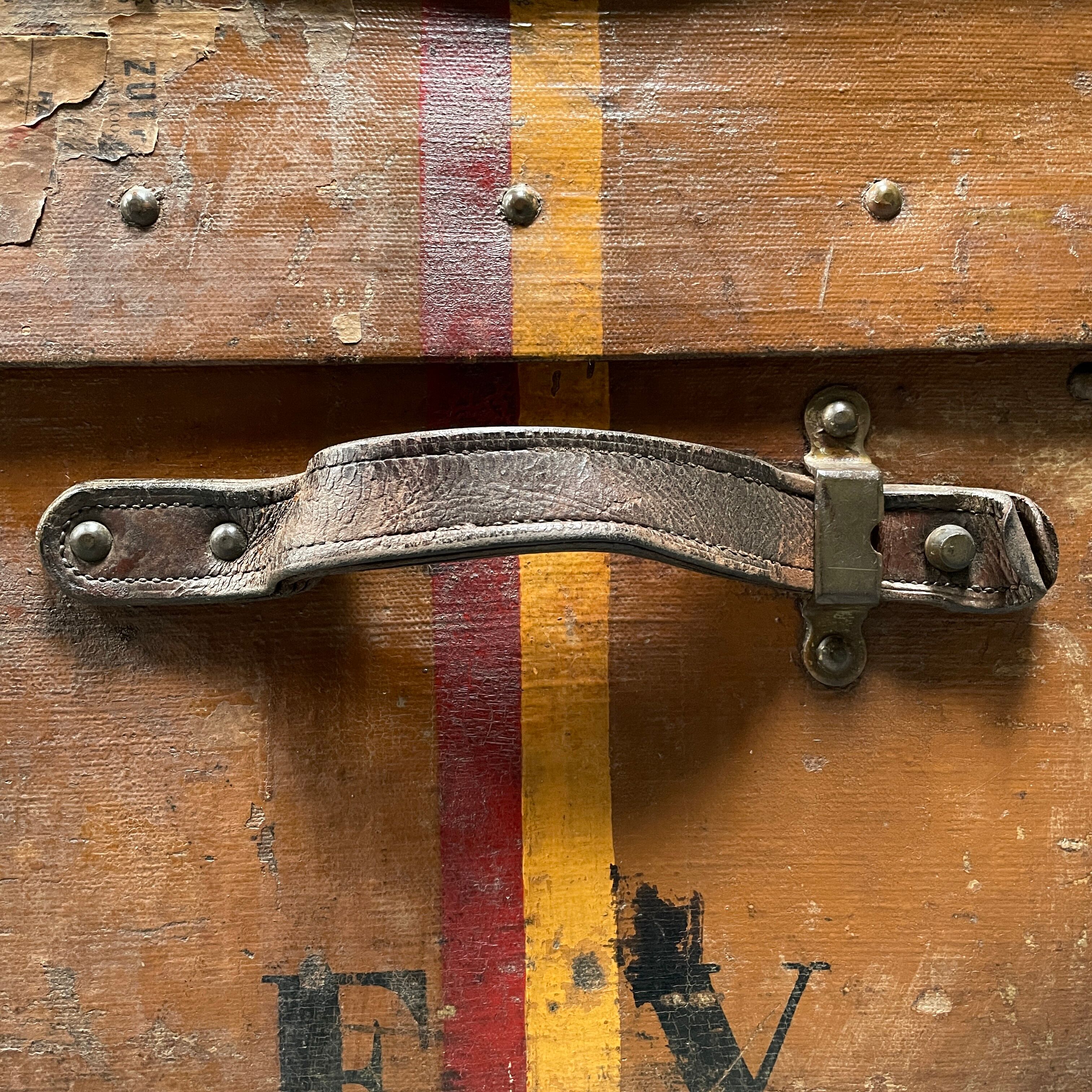 Antique brown travel case with wooden slides from the early 1900s