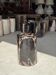 Black petrified wood side table with beige stripes, star pattern H35 D24.