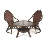 Vintage manou rattan set of 2 armchairs and table with glass top made in the 1970s