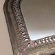 Miroir ancien doré à décor sculpté de style ethnique
