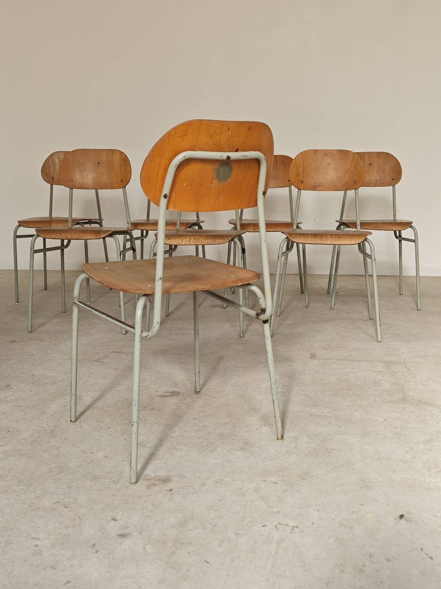 Set of 8 metal and wood school chairs  
Ex Czechoslovakia 1960
