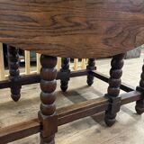 Wooden table with gateleg flaps