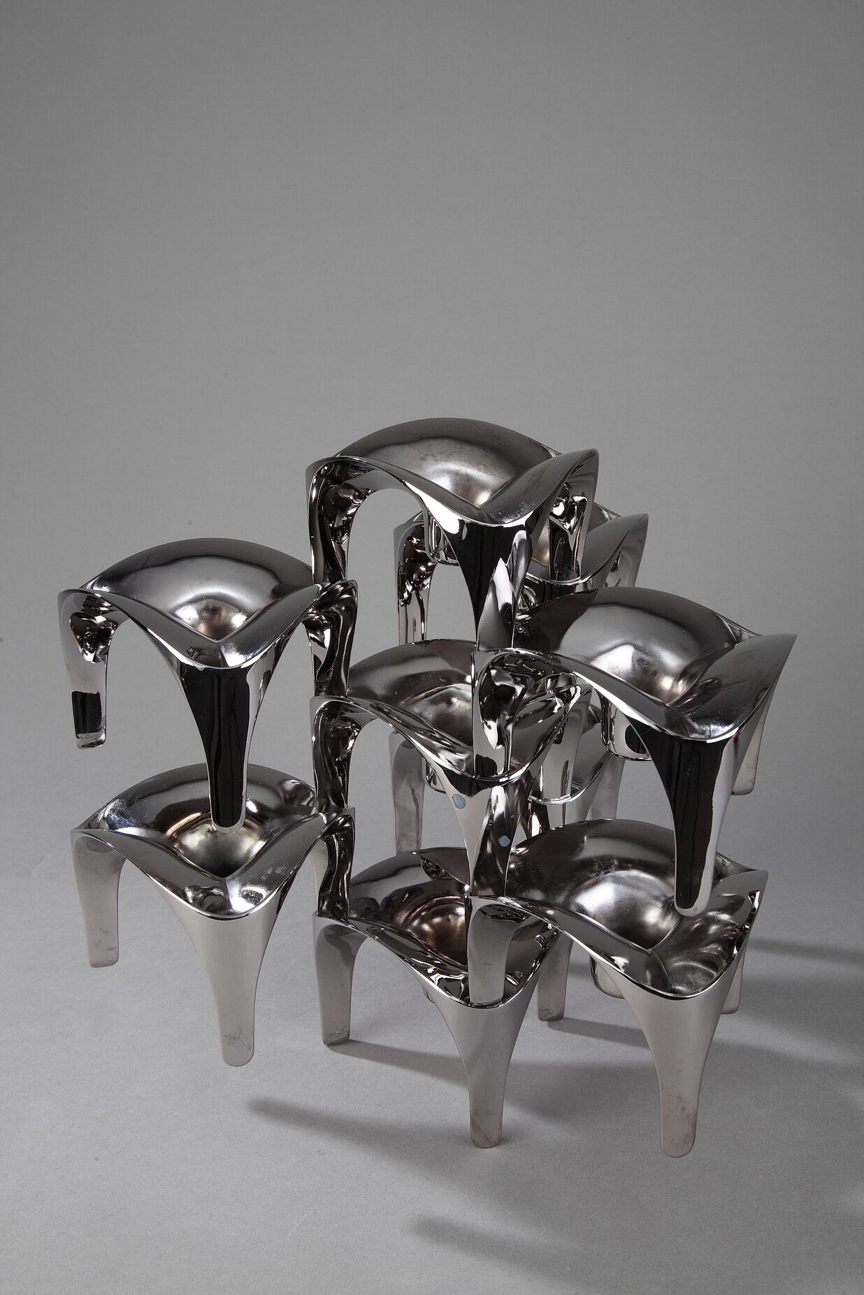 Set of 9 modular candle holders in chromed metal, nagel germany