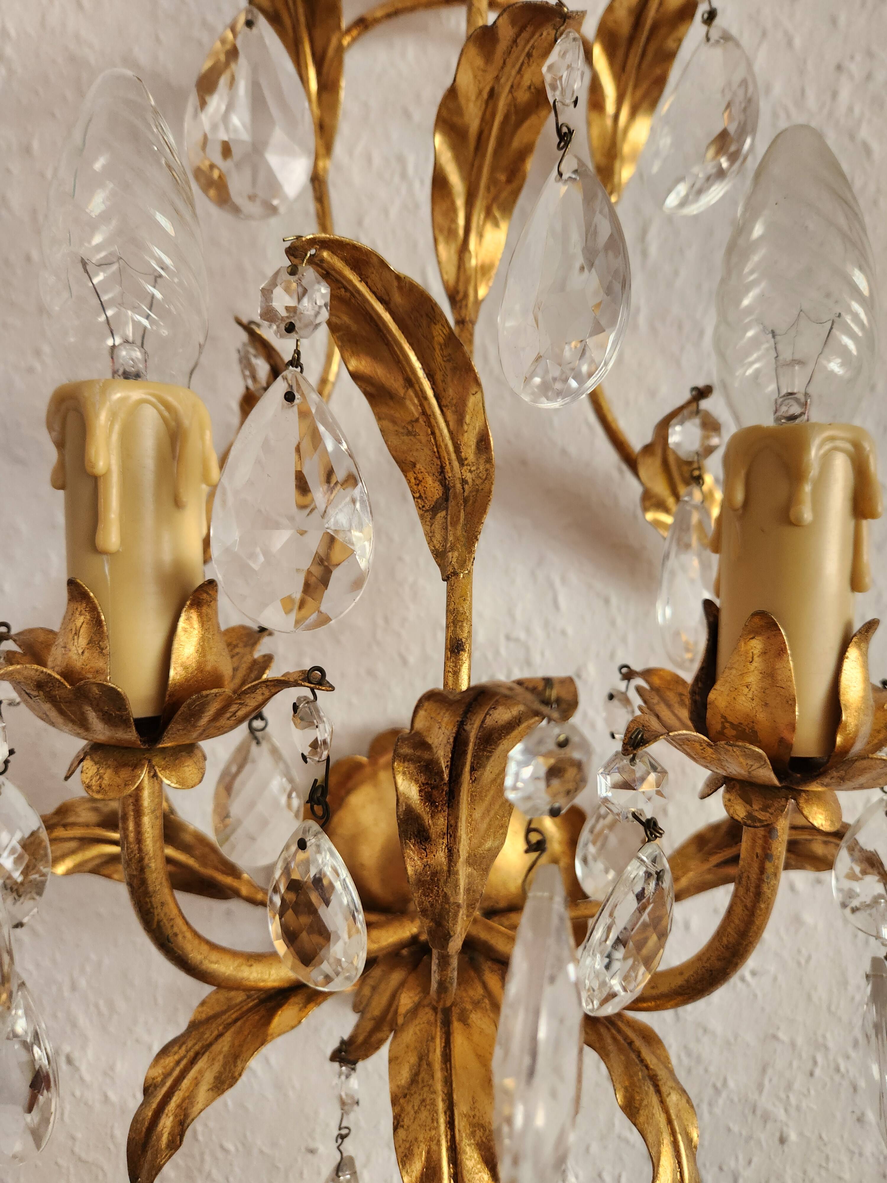 Hand-forged wall lamp gilded with gold leaf and crystals, Italy