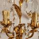 Hand-forged wall lamp gilded with gold leaf and crystals, Italy