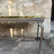 Table basse en onyx et métal style louis xv