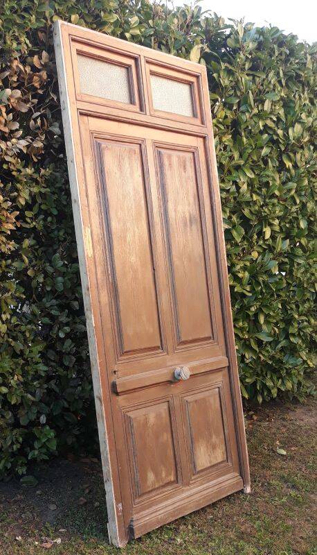 Front door and its frame, translucent glass windows, early 20th century