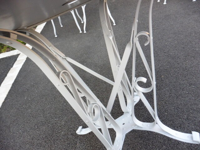 Wrought iron garden table riveted feet 1910