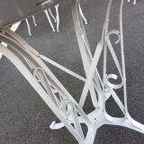 Wrought iron garden table riveted feet 1910