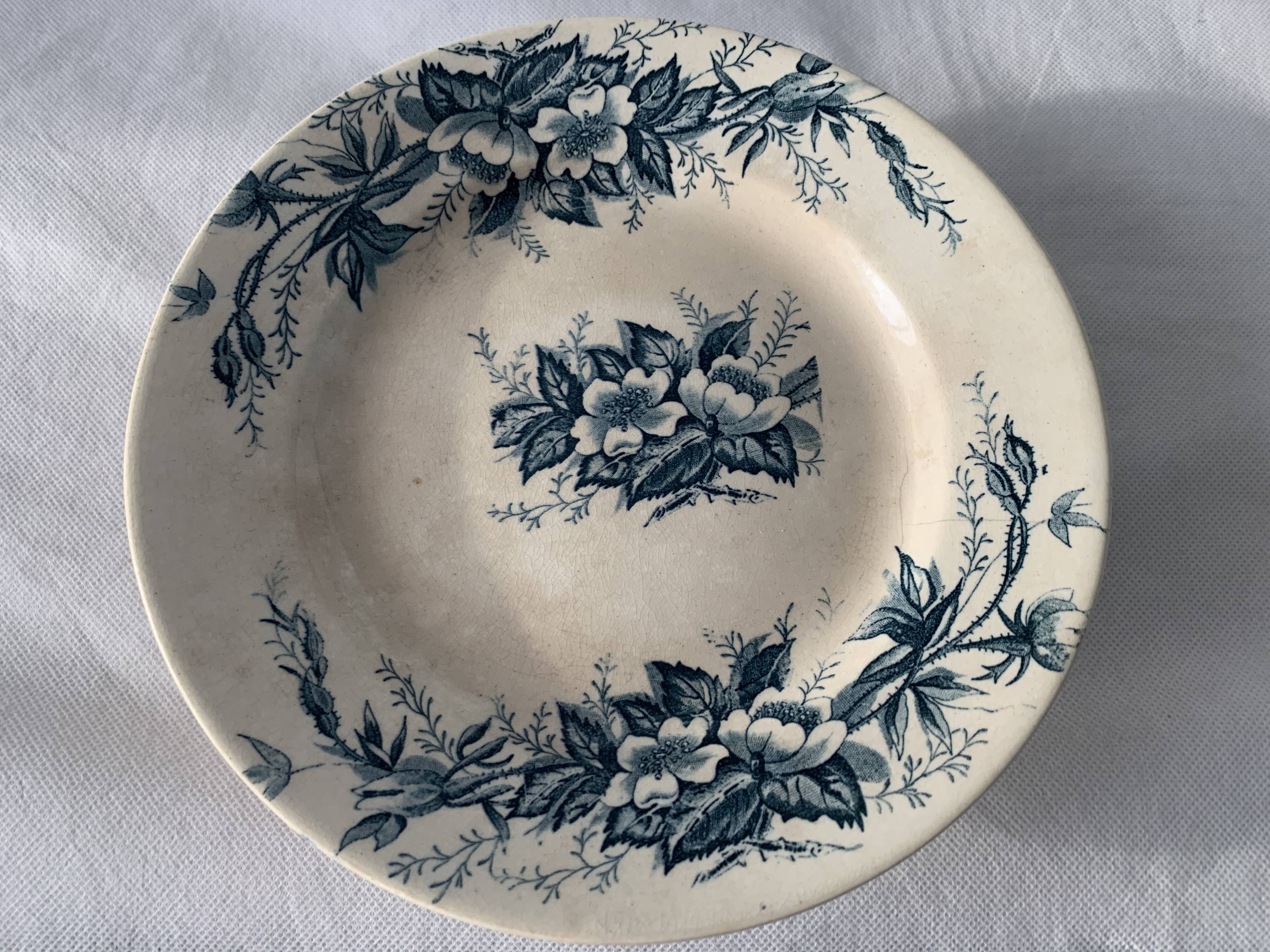 8 plates and an old compoter Terre de Fer HB and Co.