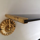 Wall shelf in glass and gold metal