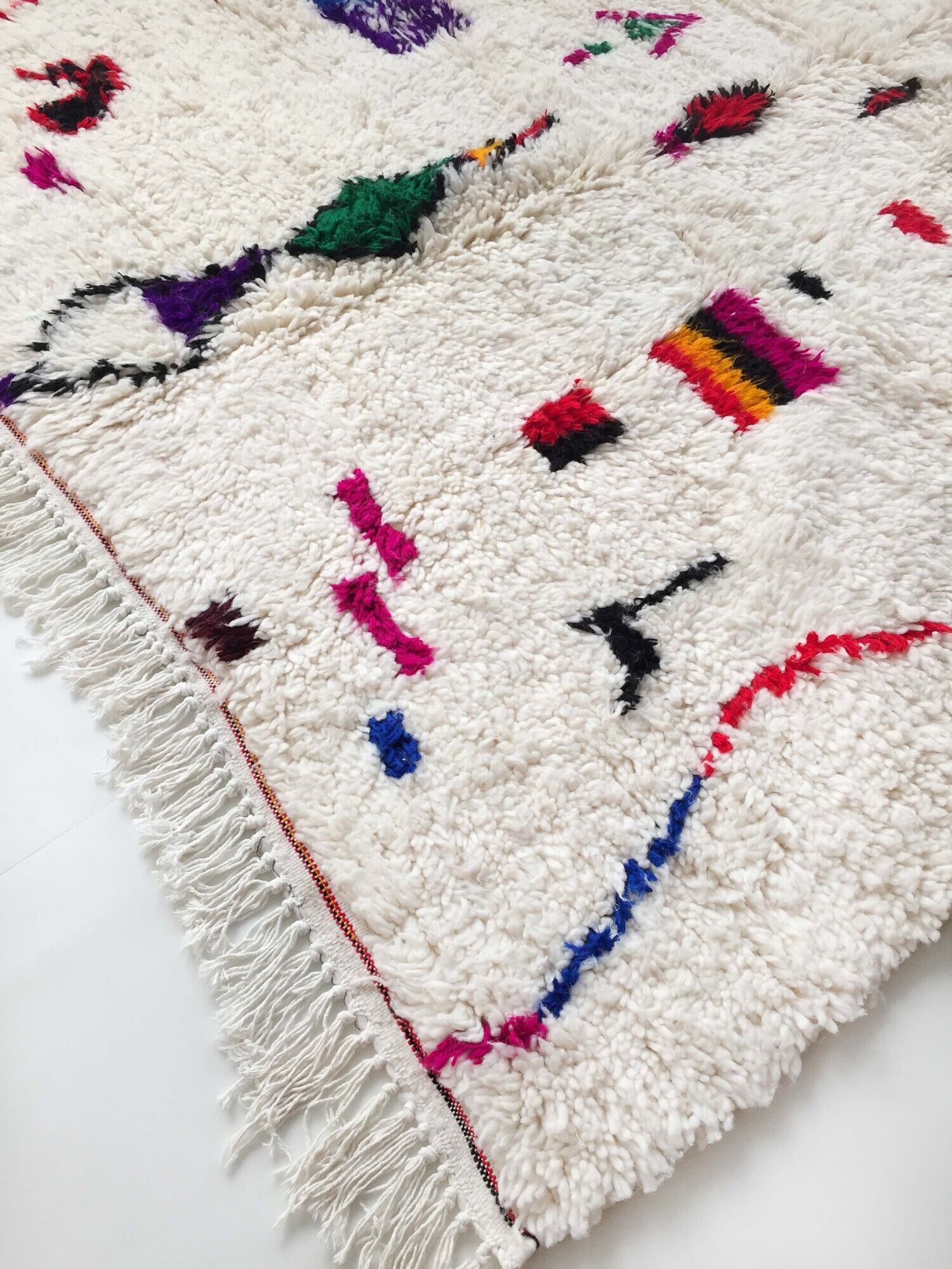 Moroccan Berber carpet Azilal unbleached with colored patterns 242x159cm