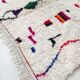 Moroccan Berber carpet Azilal unbleached with colored patterns 242x159cm