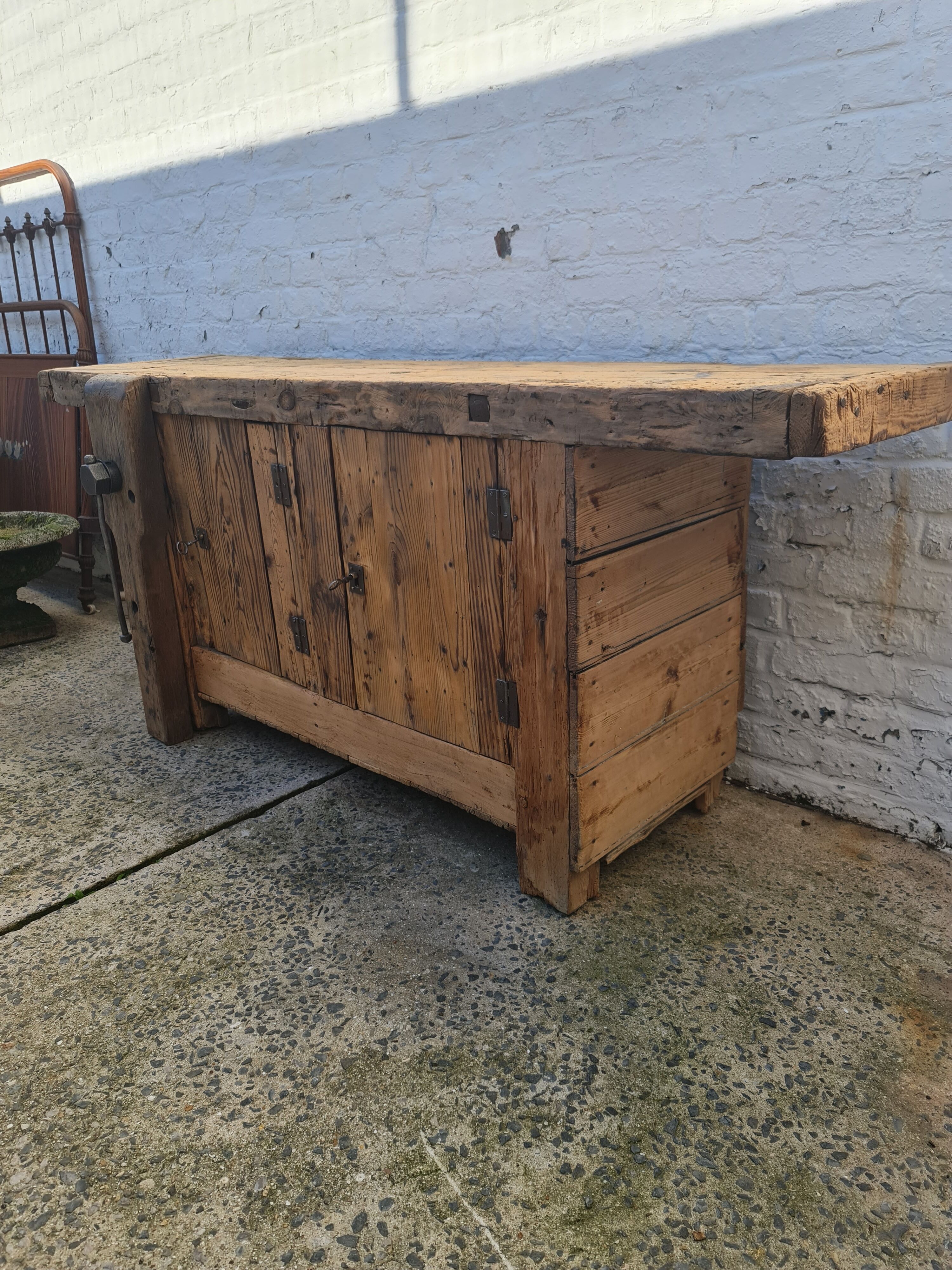 Old two-door fir workshop workbench