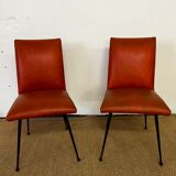 Paire de chaises en skaï orange