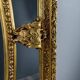 Large Louis XV style mirror in carved and gilded wood, 19th century