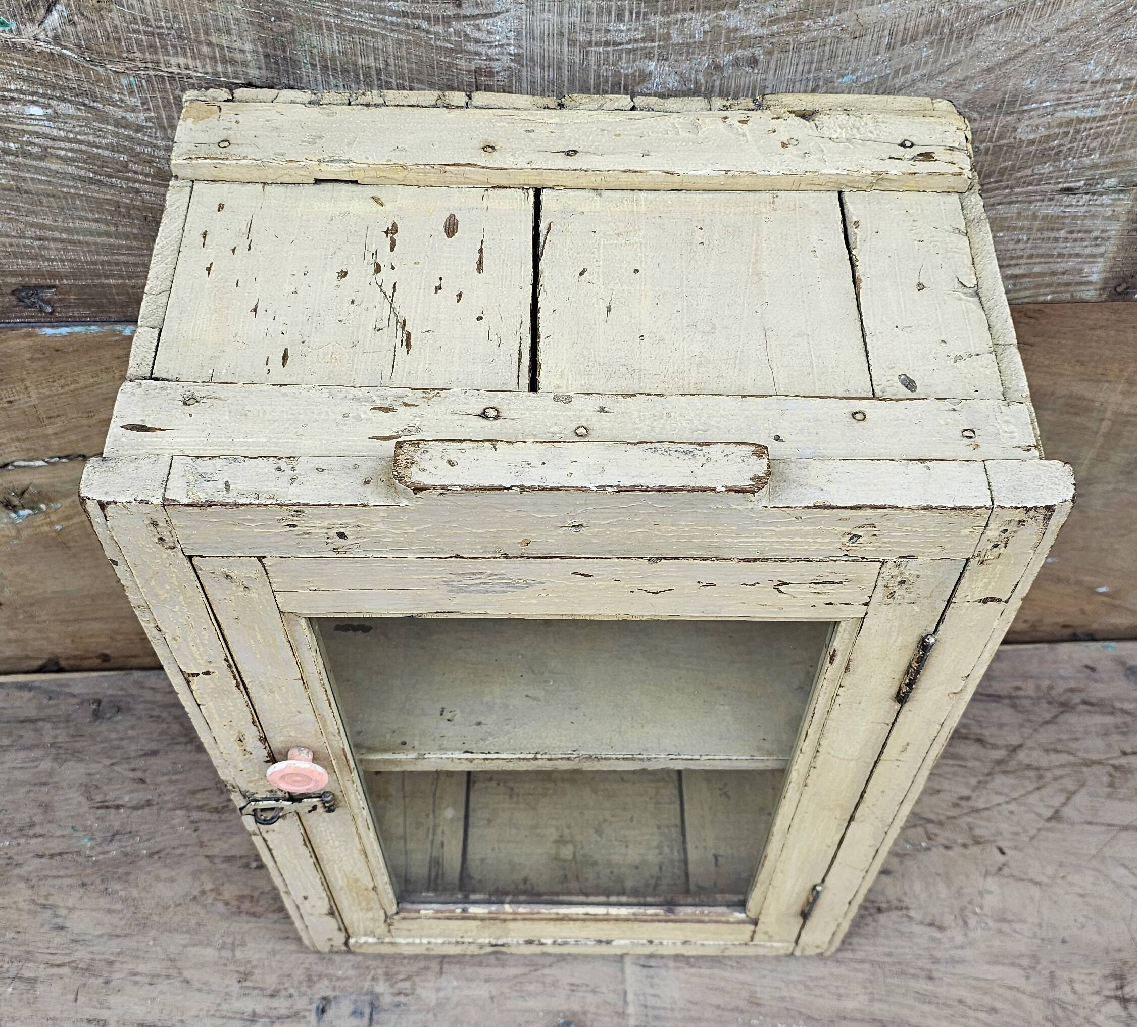 Antique Art Deco wall display cabinet in Burmese teak.
