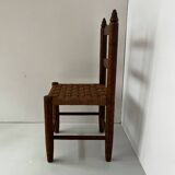 Child's chair made of wood and rope