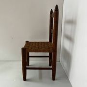 Child's chair made of wood and rope