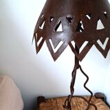 Handcrafted openwork wrought iron lamp