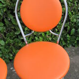 Pair of orange vintage chairs