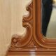 Vintage Art Deco decorative mirror with a thick frame.
