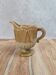 Small antique pressed glass jug in honey colour – moulded decoration