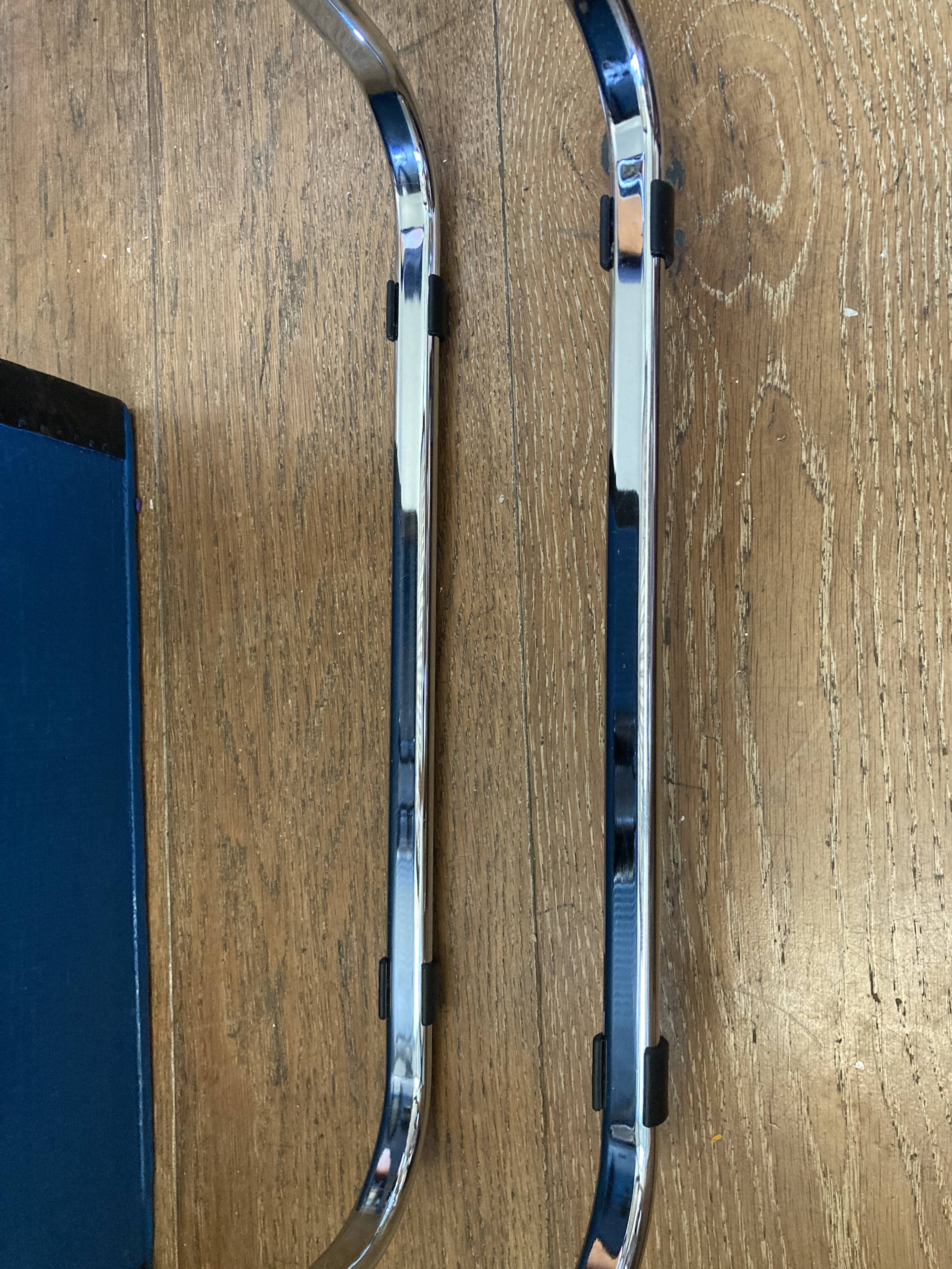 Plia chairs by Castelli in wood and cane.