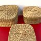 Vintage trio of small rattan nesting baskets