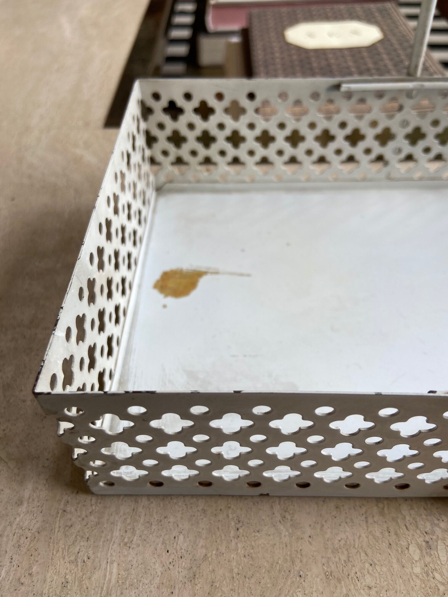 White perforated metal table basket