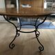 Extendable table in solid oak with wrought iron legs.