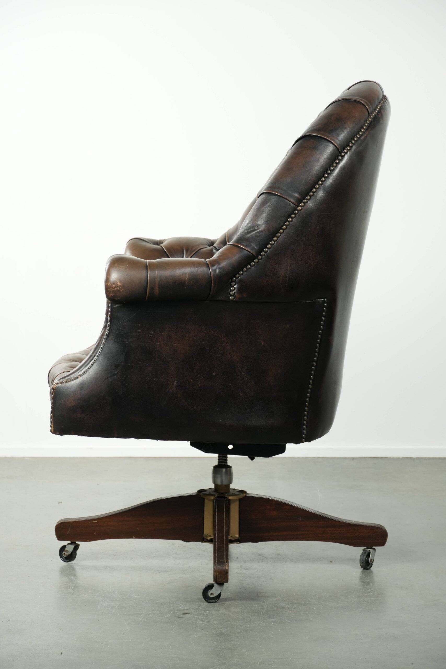 Vintage Chesterfield office chair with decorative nails in English style