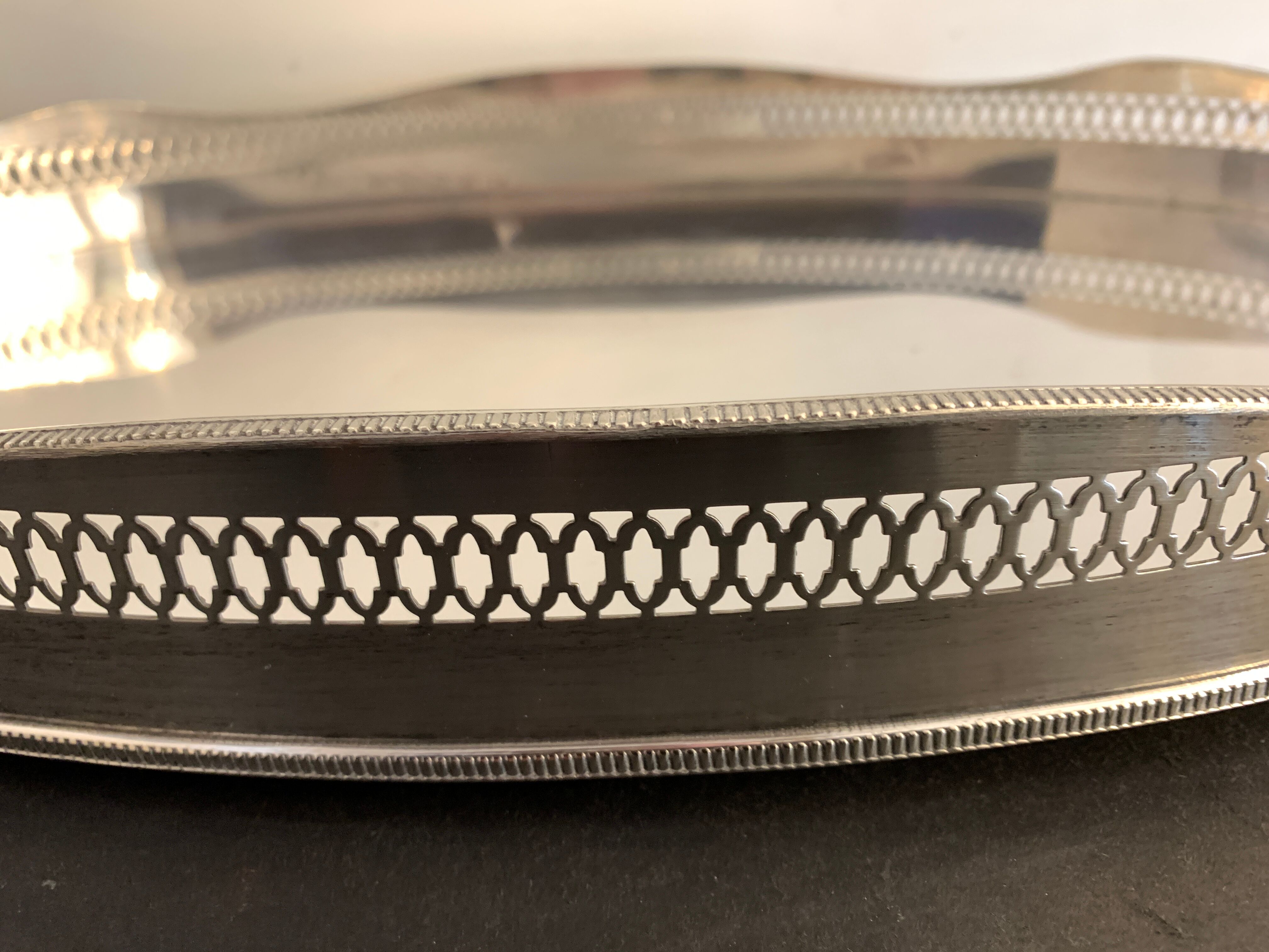 Alpaca silver metal to  lion feet and openwork borders