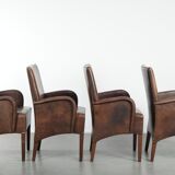 Set of 4 nicely finished dining chairs/side chairs with armrests made of cowhide leather