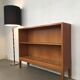 Oak bookcase with brass clogs, 60's