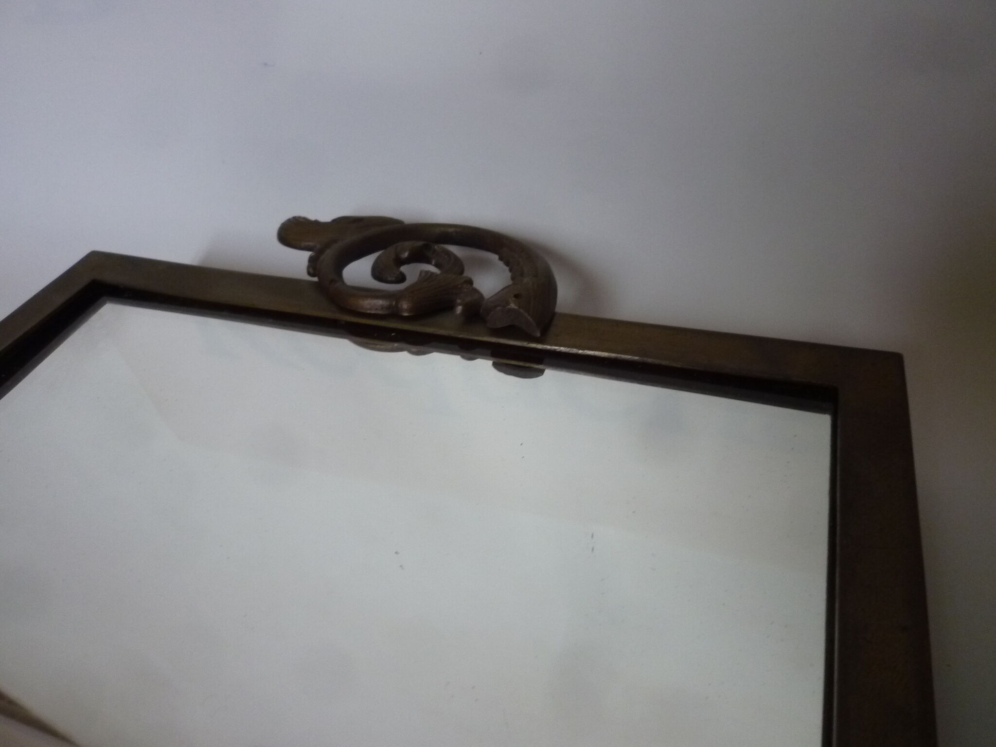 Mirror to ask bronze and brass beginning XXth 32 x 45 cm