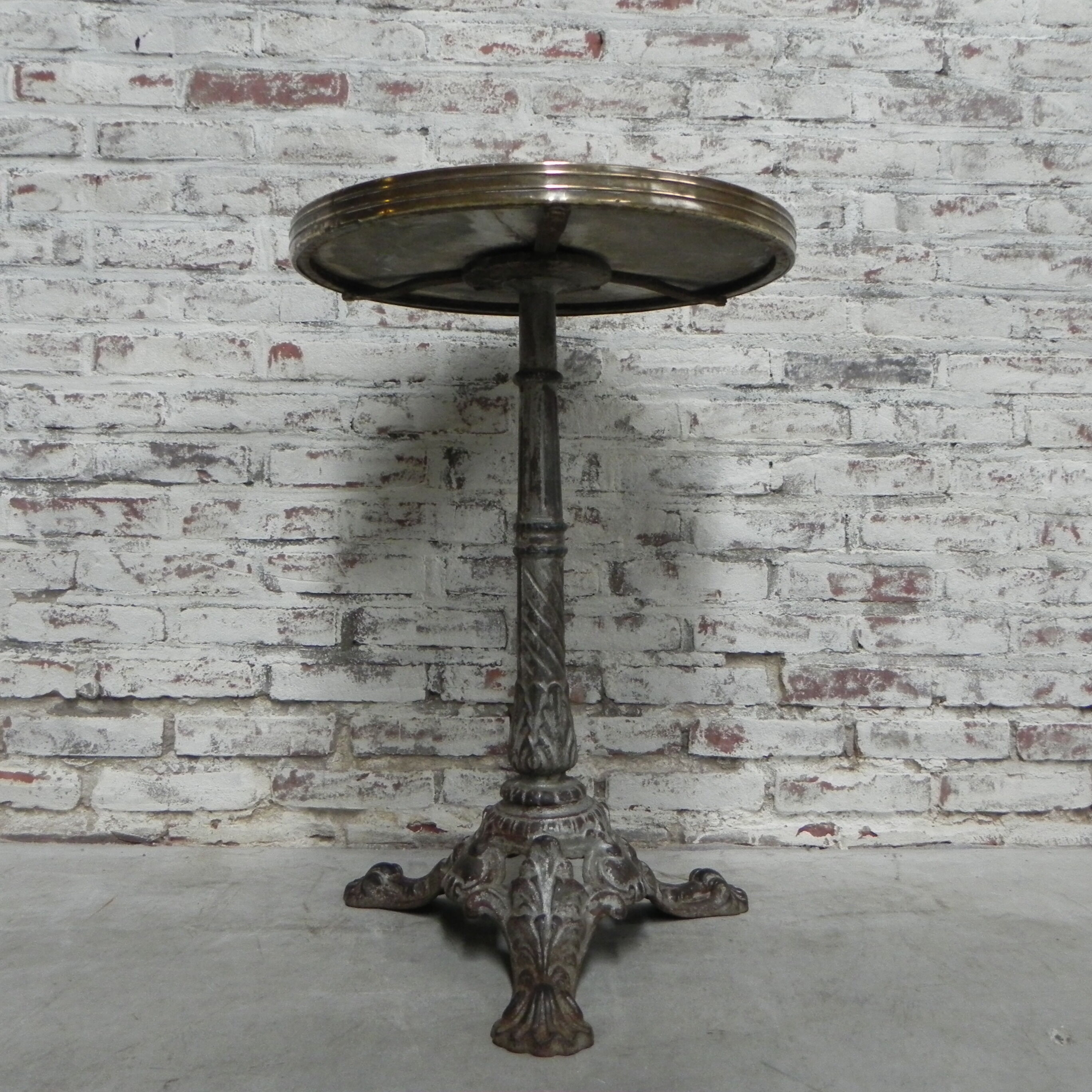 Bistro table with cast iron leg