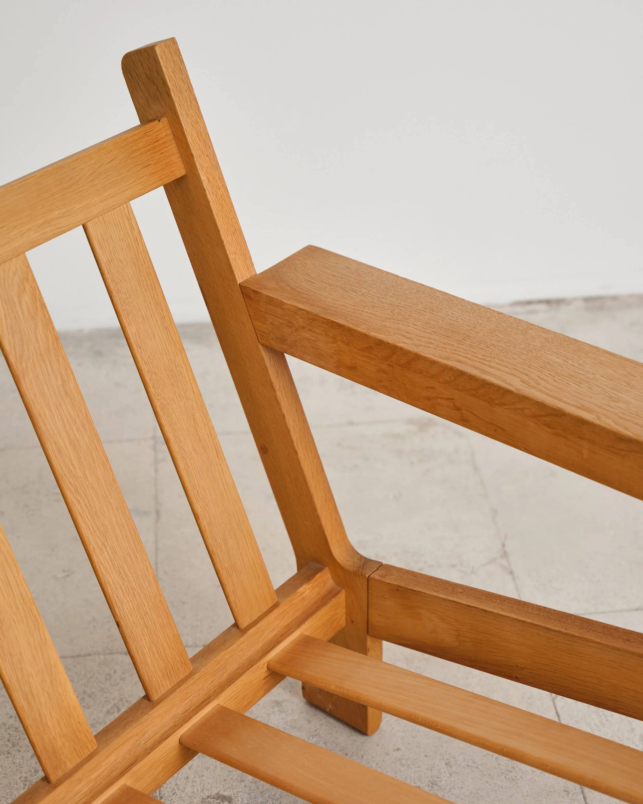 Brutalist armchair and ottoman by Tage Poulsen, Denmark, 1970s.